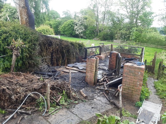 Out of control bonfire destroys garden shed